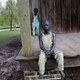 Two out of 40 statues spread about the grounds, titled, “Children of Whitney,” by Woodrow Nash, are seen in in front of one of the slave cabins, at the Whitney Plantation in Edgard, La. (Gerald Herbert/AP Images)